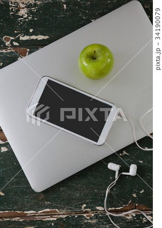 School supplies with laptop on wooden table School supplies with laptop on wooden table 34190079