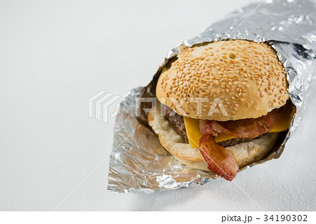 High angel view burger and French fries with tomato sauce 34190302