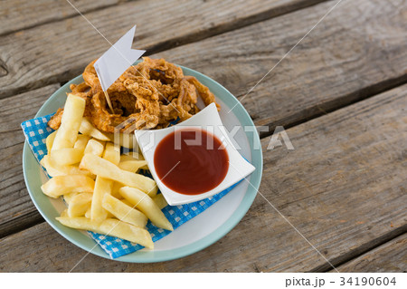 Sauce with cheese and meat on bun Sauce with cheese and meat on bun 34190604