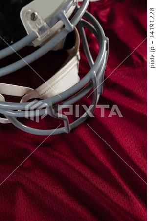 Close up of soccer ball in goal post 34191228