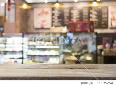bakery shop or coffee cafe blurred background bakery shop or coffee cafe blurred background 34195258