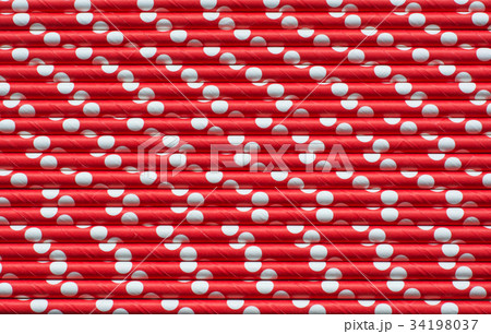 Christmas red straws as background.Top view. Christmas red straws as background.Top view. 34198037