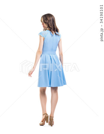 Back view of young beautiful woman in blue dress Back view of young beautiful woman in blue dress 34198101