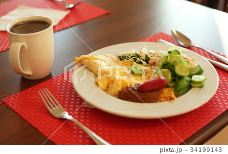 pastry cake plate on red tissue table cloth 34199143