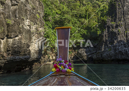 Sea view with traditional longtail boats 34200635