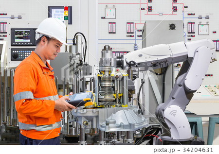Engineer programing automated robotic industry  34204631