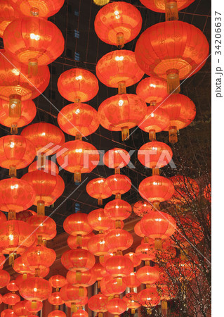 Red lamp hanging on ceiling Red lamp hanging on ceiling 34206637