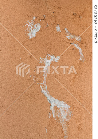 Paint peeling off from the wall 34208785