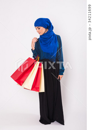 Arab Woman with shopping bags Arab Woman with shopping bags 34211699