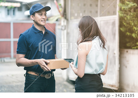 Delivery man with his customer 34213105