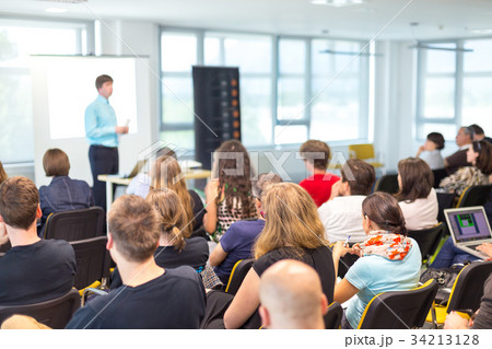 Speaker giving presentation on business conference Speaker giving presentation on business conference 34213128