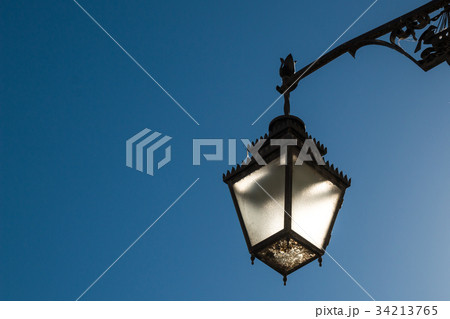 Street lamp - lantern during the daytime Street lamp - lantern during the daytime 34213765