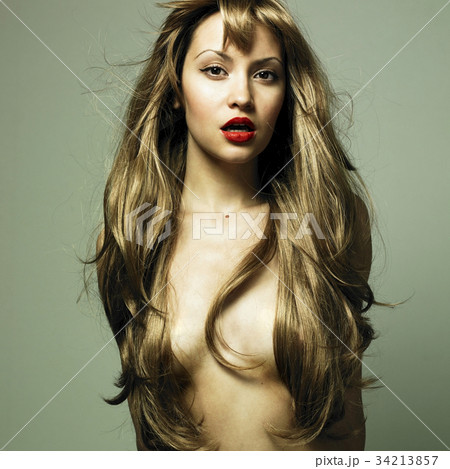 Beautiful woman with magnificent hair 34213857