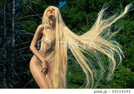 Beautiful lady in the coniferous forest Beautiful lady in the coniferous forest 34214243