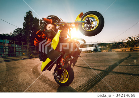 Child on a motorcycle 34214669