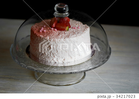 The pastry chef cut the cake. Strawberry yogurt The pastry chef cut the cake. Strawberry yogurt 34217023