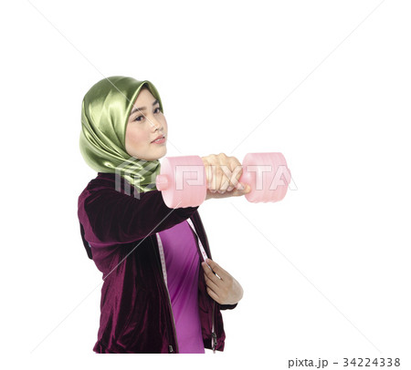 Portrait of a active healthy hijab woman and dumbells for promot 34224338