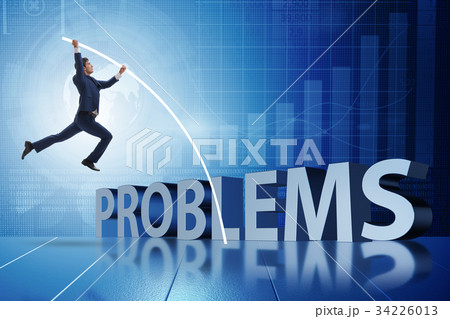 Businessman jumping over problems in business 34226013