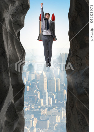 Businessman overcoming challenges in business Businessman overcoming challenges in business 34233975