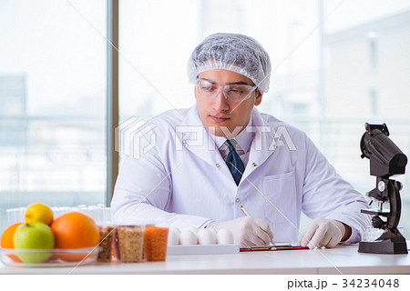 Nutrition expert testing food products in lab Nutrition expert testing food products in lab 34234048