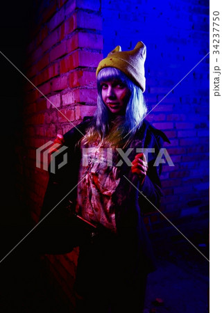 Portrait of funny zombie girl in halloween time Portrait of funny zombie girl in halloween time 34237750