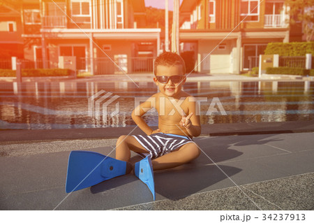 Little boy in a flippers for diving Little boy in a flippers for diving 34237913