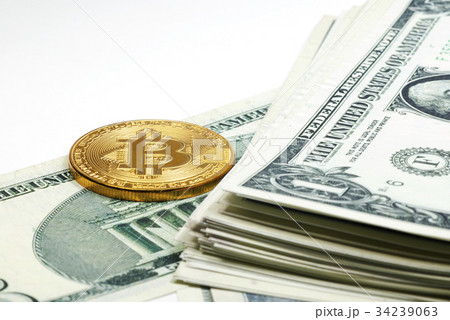 Golden Bitcoin coin on close up 34239063