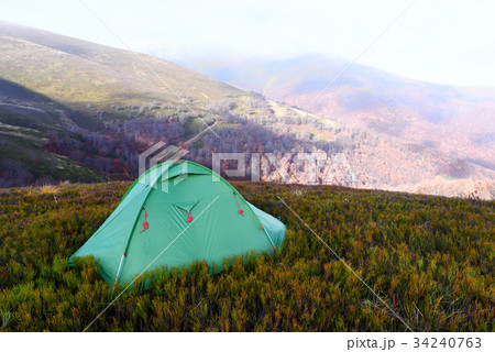 Tent on autumn mountains Tent on autumn mountains 34240763