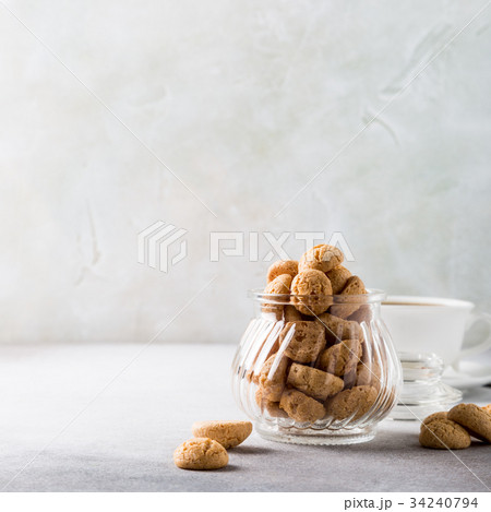 Amaretti cookies with white cup of coffee 34240794