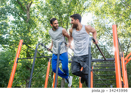 Two handsome young men passionate about fitness Two handsome young men passionate about fitness 34243996