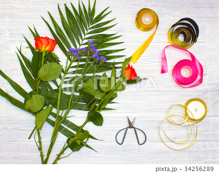 The florist desktop with working tools on wooden 34256289