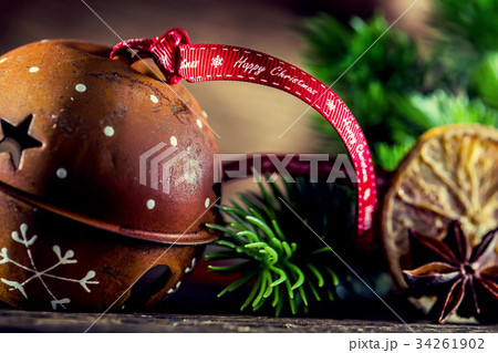 Jingle bell christmas decorations and ribbon. 34261902