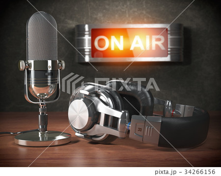 Vintage microphone and headphones signboard on air 34266156