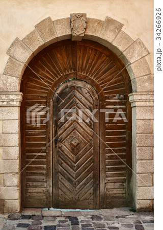 Old wooden door from plank, vintage style Old wooden door from plank, vintage style 34266926