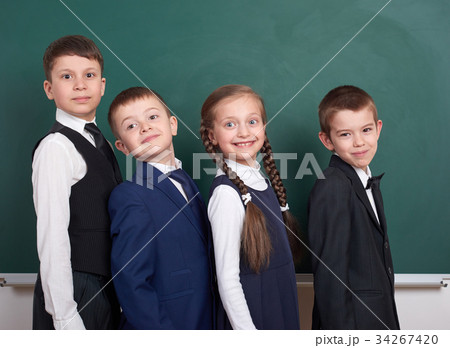 school child on blackboard background 34267420