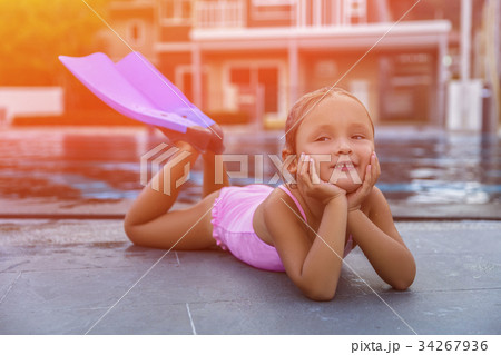A happy young girl relaxing A happy young girl relaxing 34267936