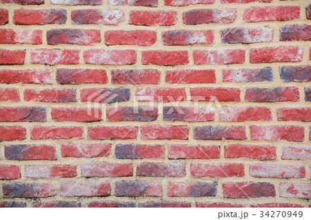 Wall of red brick. The beautiful texture. 34270949