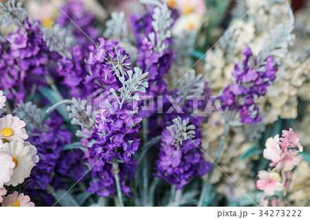 Purple flowers background. 34273222