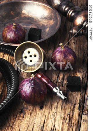 Arabic smoking hookah with figs 34273616