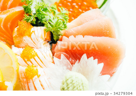 Raw and fresh mixed sashimi with salmon , tuna , hamaji and other Raw and fresh mixed sashimi with salmon , tuna , hamaji and other 34279304