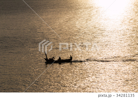 Boat and sunset on the sea background. Boat and sunset on the sea background. 34281135