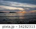 Boat in the sea and sunset on sky background. 34282313