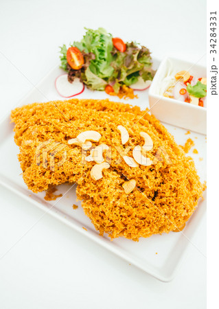 Crispy catfish salad 34284331