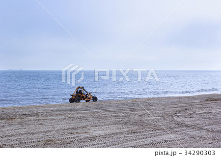 Terrain vehicle at the beach 34290303