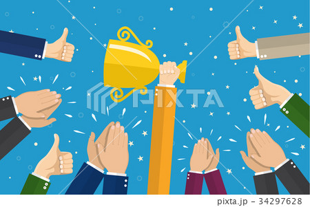 Businessman holding up a winning trophy. 34297628