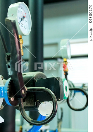 Closeup of manometer in a boiler room 34300176