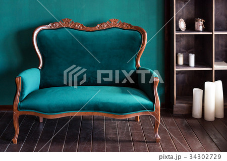 Antique wood sofa couch in vintage room. Classical Antique wood sofa couch in vintage room. Classical 34302729