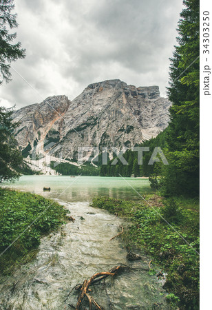 Mountain Lake in Valle di Braies surrounded by Mountain Lake in Valle di Braies surrounded by 34303250