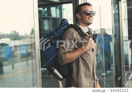 Happy man is going out of doors 34305121