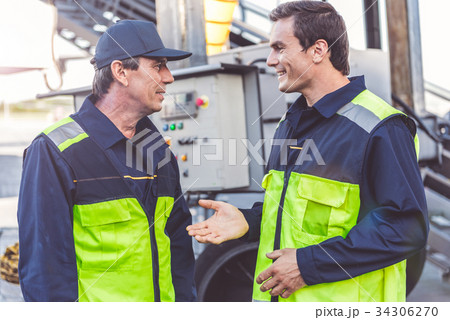Outgoing man telling with smiling partner 34306270